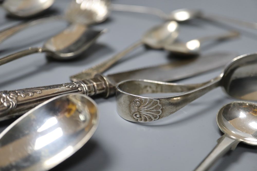 A silver-mounted and ivory page turner and a small collection of silver flatware, Georgian and later,